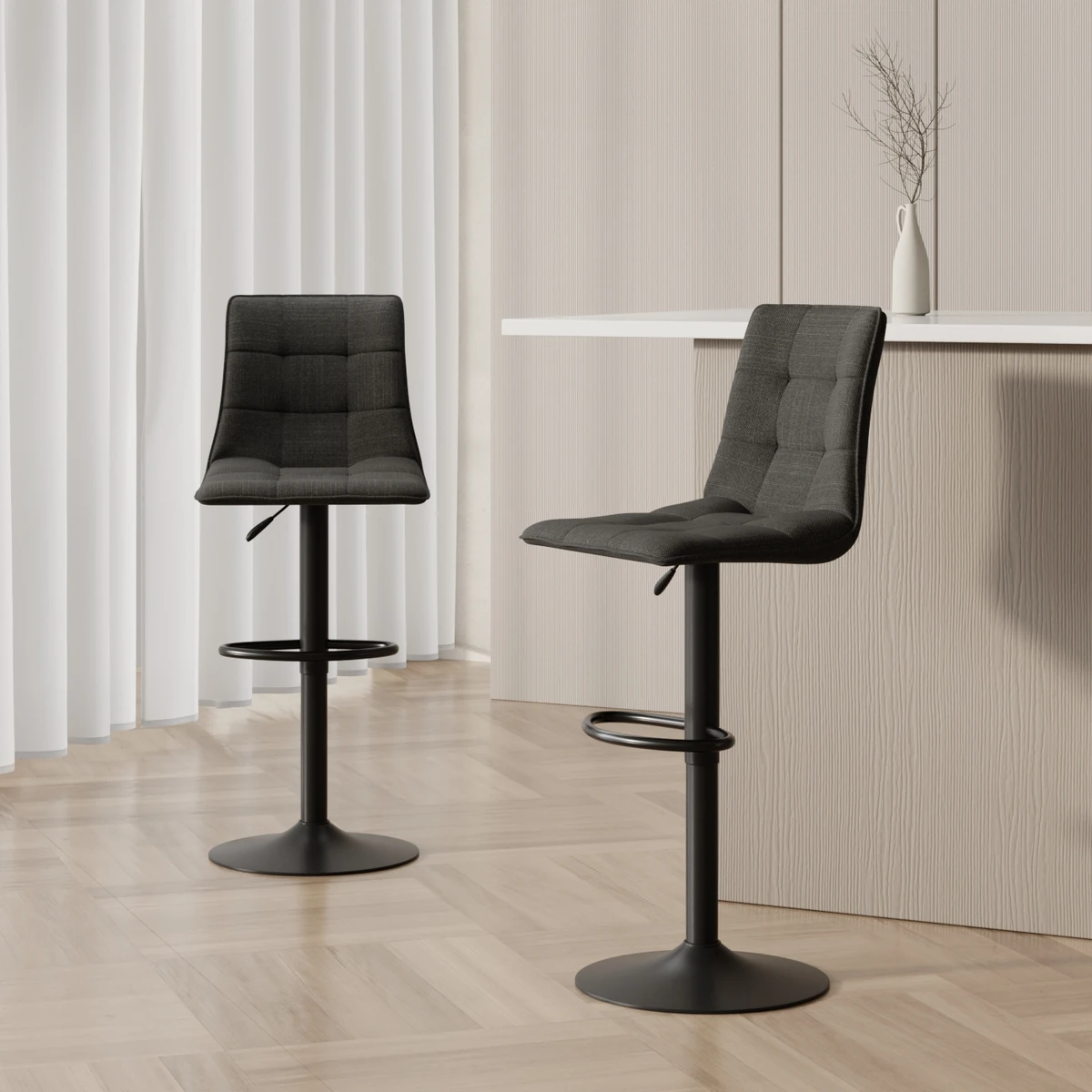 Detail of a stainless steel base with footrest on a contemporary bar stool